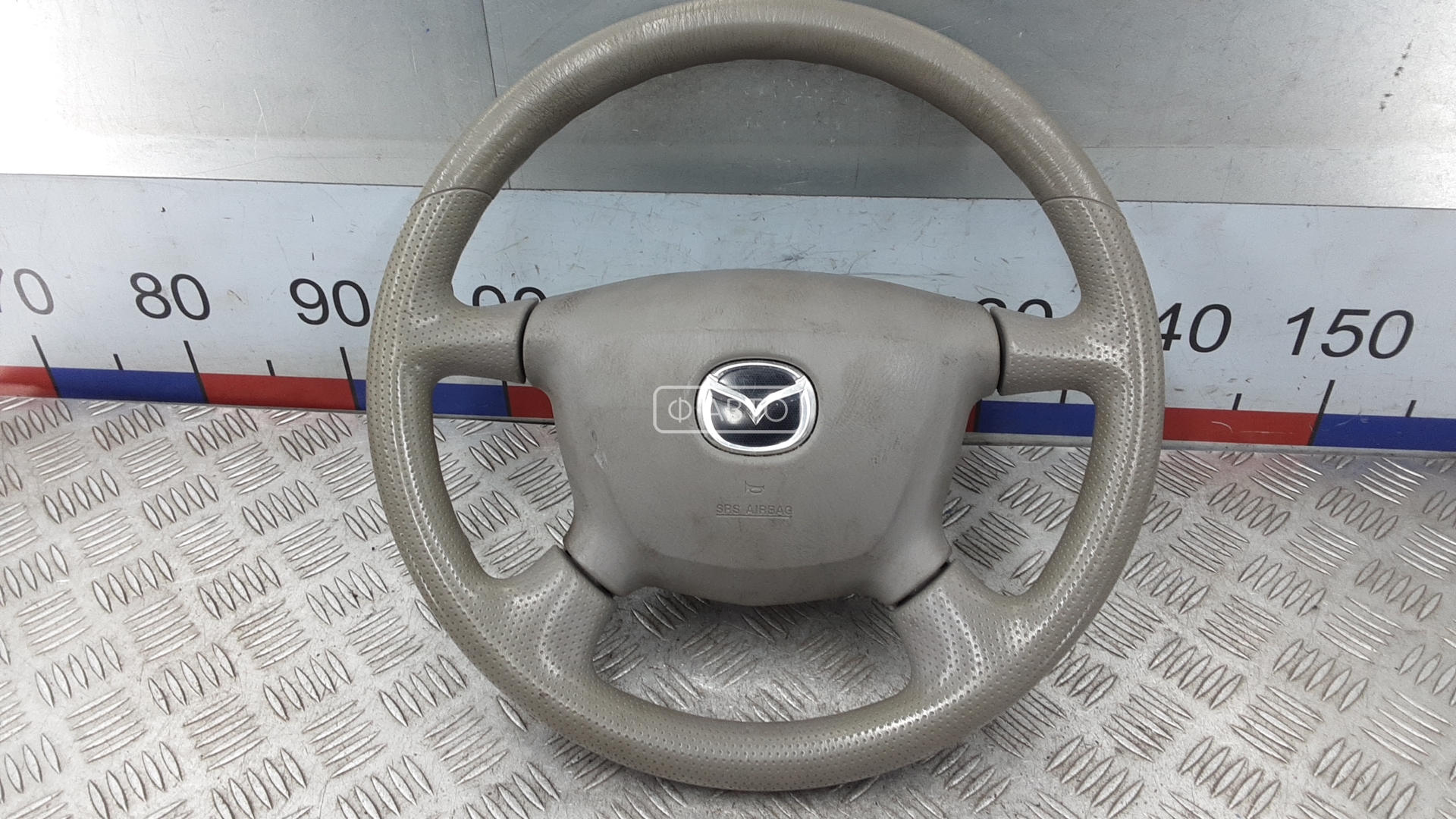 Руль - Mazda Demio (1997-2002)